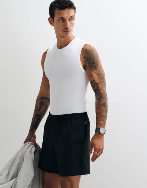4505 naadloze geribbelde muscle fit training tanktop in wit, 5 van 5