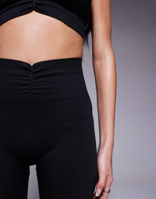 4505 – Nahtlose, vorne geraffte Sport-Leggings in Schwarz mit hohem Bund , 4 von 5
