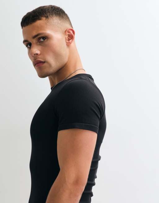 4505 – Nahtloses, körperbetontes Sport-T-Shirt in geripptem Schwarz, 3 von 5