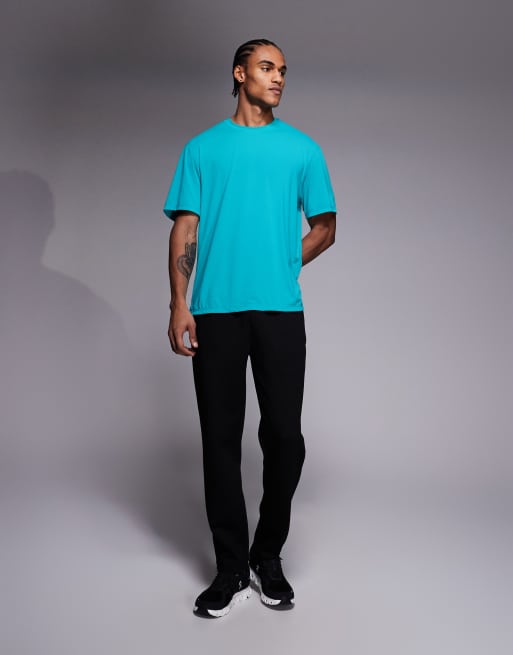 4505 - Oversized hardloop-T-shirt van sneldrogend nylon met performance mesh in fel turquoise , 2 van 5