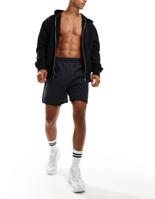 Pantaloncini uomo palestra 2 in 1 traspiranti con tasca con zip