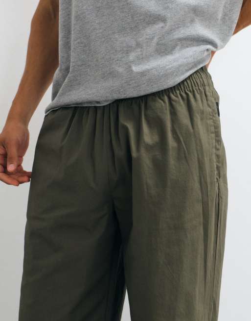 4505 - Pantaloni a fondo ampio in cotone ripstop color oliva con tasche con zip, 5 di 5