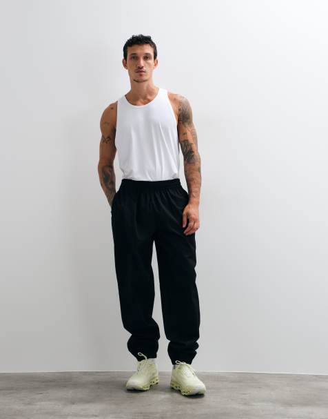 4505 - Pantaloni da allenamento ampi in cotone ripstop neri con polsini e tasche con zip - view 1