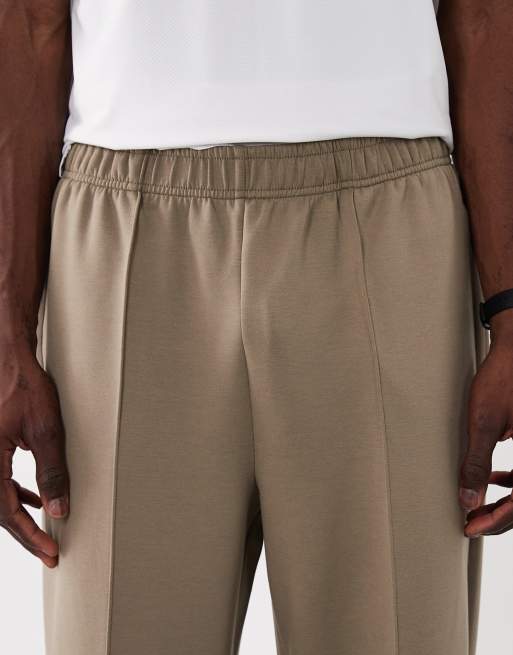 4505 - Performance - Joggers deportivos beis grisáceo de pernera ancha con detalle de jaretas, 4 de 5