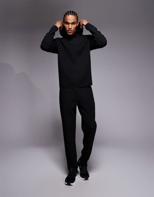 4505 performance tapered leg sweatpants with zipper pockets in black, 2 of 5