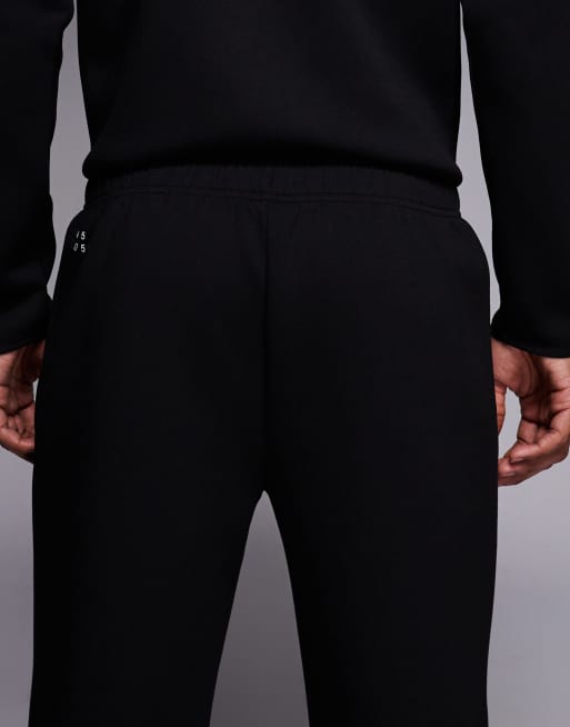 4505 performance tapered leg sweatpants with zipper pockets in black, 4 of 5
