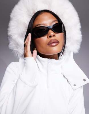 ASOS 4505 Petite Ski belted ski suit with slim kick leg and faux fur hood in white