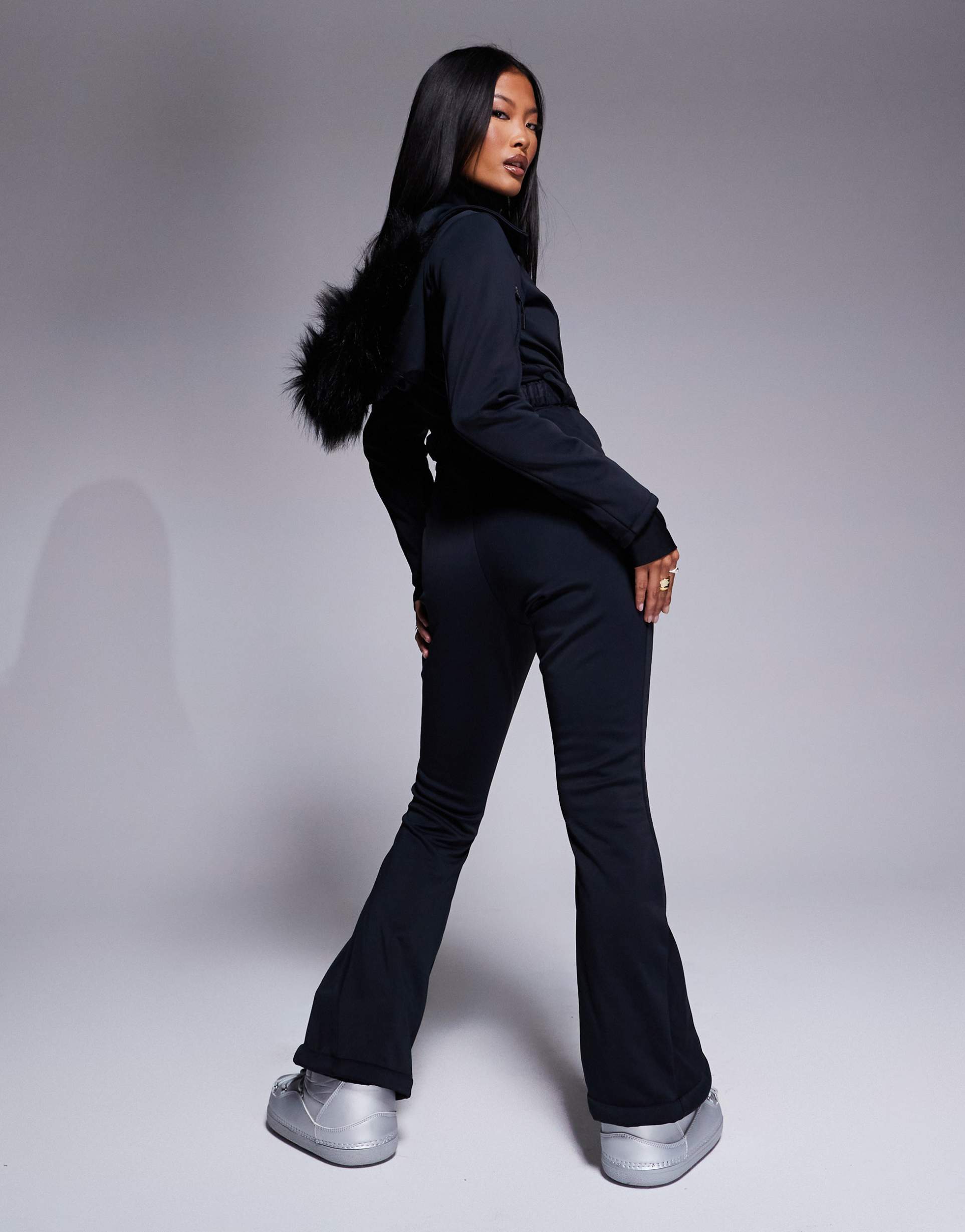 4505 petite ski belted ski suit with slim kick legs and faux fur hood in black
