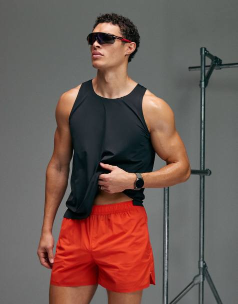 4505 Premium 3 inch woven running short with zip pockets and bonded hem in burnt orange - view 1