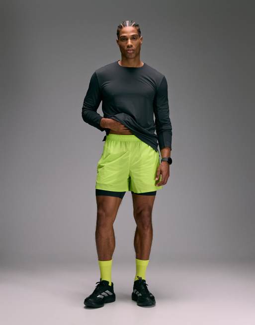 4505 Premium 3 inch woven running short with zip pockets and bonded hem in lime, 3 of 5