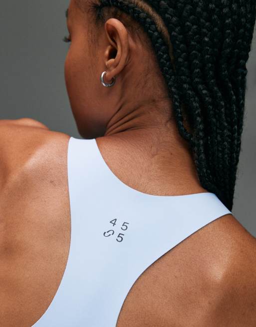 4505 Premium high impact zip front running sports bra with adjustable straps and reflective detailing in sky blue, 3 of 4