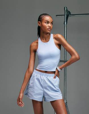 4505 Premium Internal Support Running Tank Top With Bonded Seams And Zip Phone Pocket In Multi