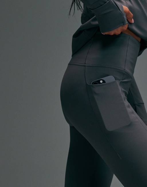 4505 Premium reflective high waist running legging with phone pockets and bonded seams in turbulence grey, 3 of 5