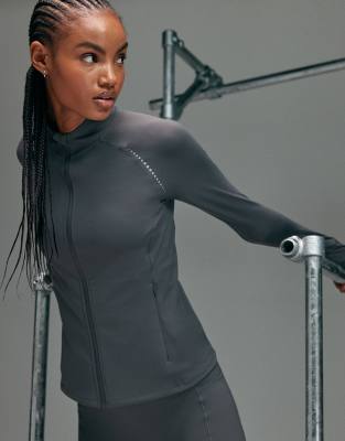 4505 - Premium - Reflektierende Laufjacke in Turbulenzgrau mit umgeschlagenen Bündchen, Reißverschluss und Handytasche m...