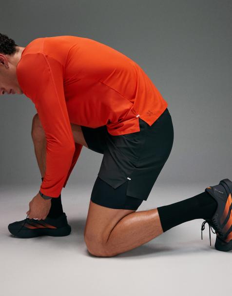 4505 Premium woven reflective 2-in-1 running short with zip pockets and bonded hem in void black - view 1