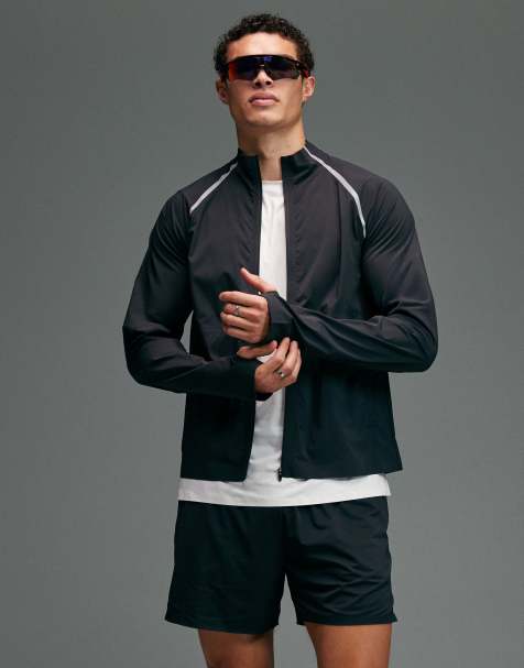 4505 Premium woven water repellent running jacket with zip pockets and reflective detail in void black - view 1