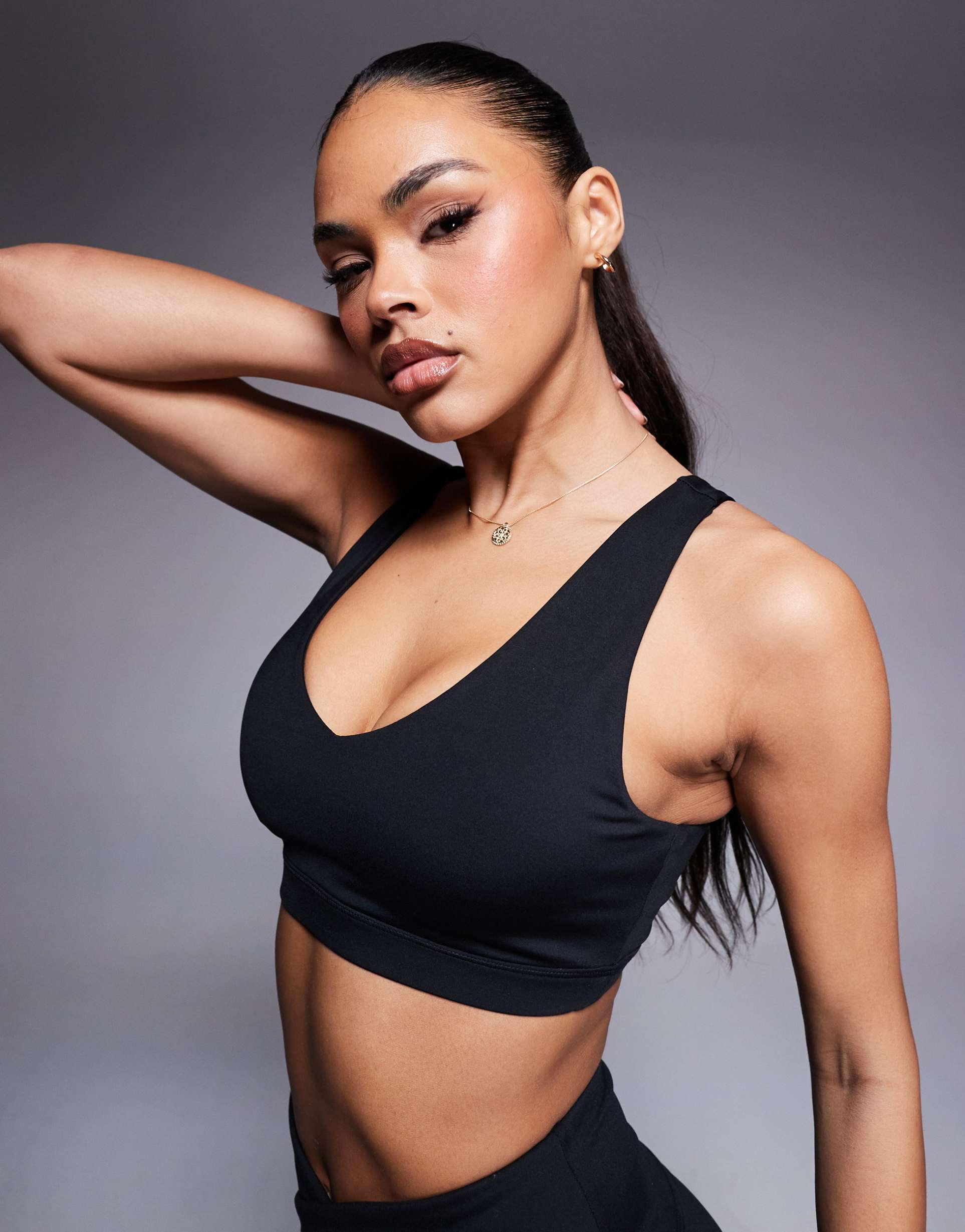 4505 racer back medium support sports bra in black