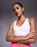 [ASOS] 4505 racer back medium support sports bra in white 4 White
