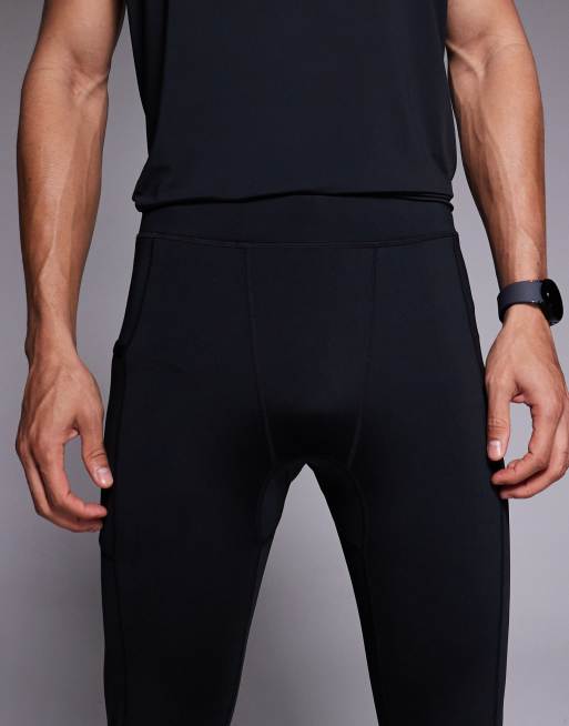 4505 reflective quick dry base layer running tights with energy gel pocket in black, 3 of 5