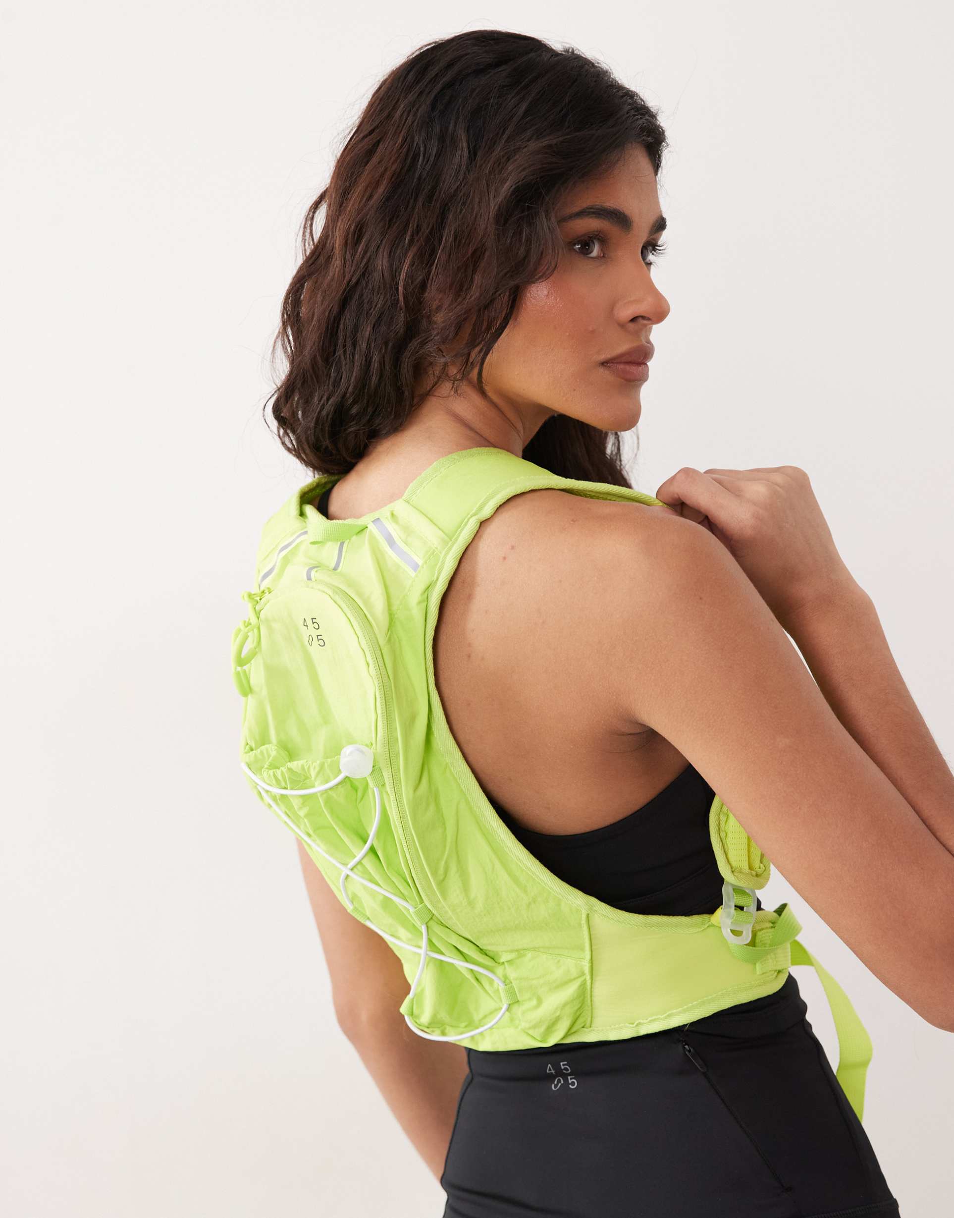 4505 reflective running tank top with zip pocket and water bottle holder in lime