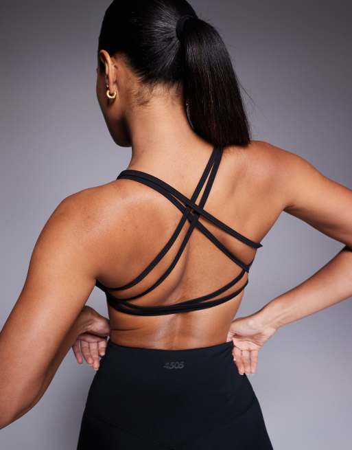 4505 - Reggiseno sportivo a sostegno leggero nero morbido con imbottitura rimovibile e incrociato sul retro