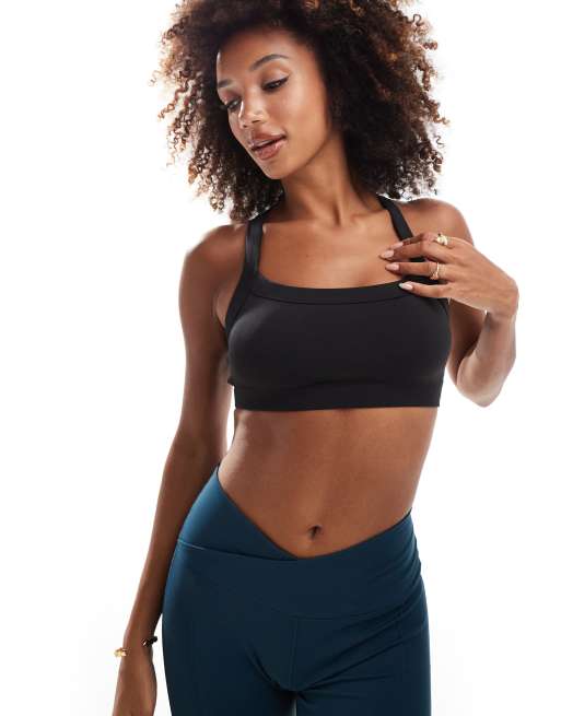 4505 - Reggiseno sportivo a supporto medio nero con spalline regolabili incrociate sul retro 