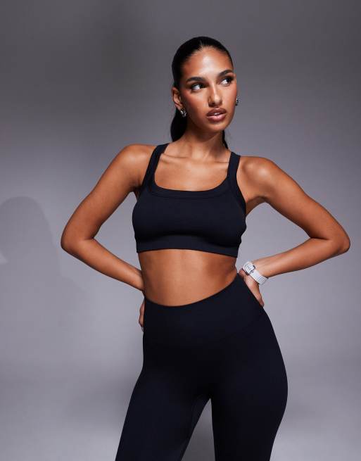 4505 - Reggiseno sportivo nero senza cuciture modellante a sostengo medio con spalline regolabili