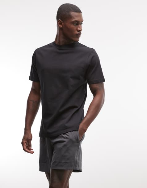 4505 – Regulär geschnittenes T-Shirt aus schwerer Baumwolle in Schwarz mit schnelltrocknendem Finish - view 1