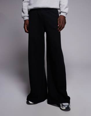 4505 - Rest Day - Pantalon de jogging ultra-oversize en coton épais 440 g/m 2 à poches zippées - Noir délavé