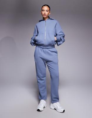 4505 - Rest Day - Schwere Baumwoll-Jogginghose in verwaschenem Steingrau mit niedrigem Bund und Bündchen, 420 g/m²