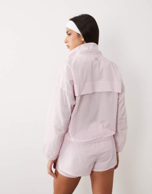 4505 ripstop overhead water repellent track jacket with chest pocket in light pink, 4 of 4