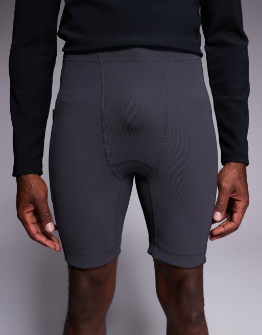 4505 running base layer ribbed legging shorts with phone pocket in charcoal, 4 of 5