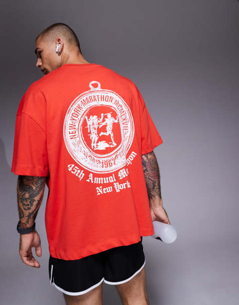 4505 – Running – Röd t-shirt i bomull och oversize med tryck baktill och snabbtorkande finish - view 1