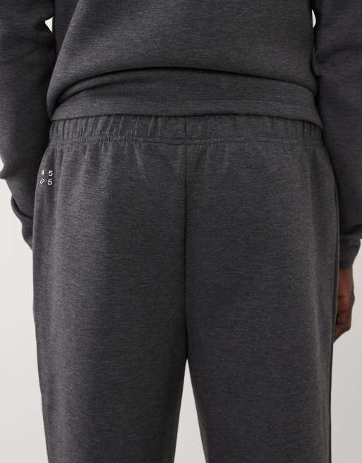 4505 – Schmal zulaufende Funktions-Jogginghose in Anthrazit meliert mit Reißverschlusstaschen, 5 von 5