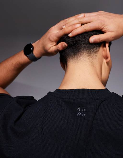 4505 – Schnelltrocknendes Funktions-T-Shirt in Schwarz mit Waffelstruktur, 5 von 5