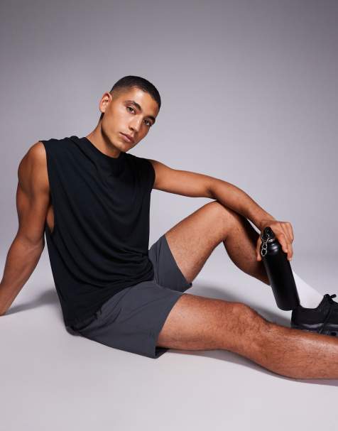 4505 – Schnelltrocknendes, kastiges Trainings-Tanktop aus Performance-Jersey in Schwarz mit Oversize-Passform - view 1