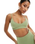 [ASOS] 4505 seamless double rib light support sports bra with removable padding in pistachio-Green L Pistachio
