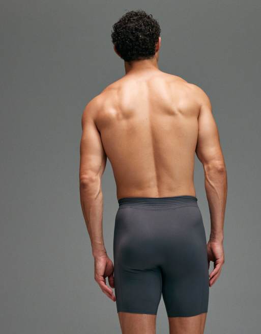 4505 seamless physique defining compression base layer 8 inch half tights in charcoal, 5 of 5