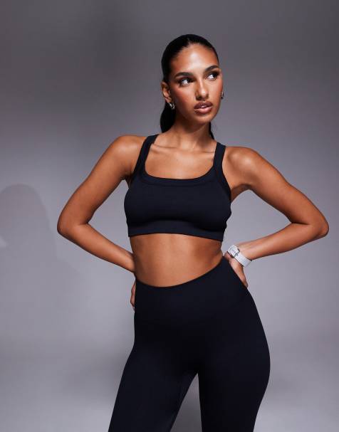 4505 seamless sculpting medium support sports bra with adjustable straps in black - view 1