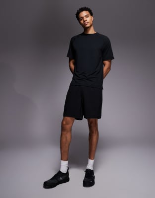 4505 - Short de sport 18 cm à taille élastique et poches zippées - Noir