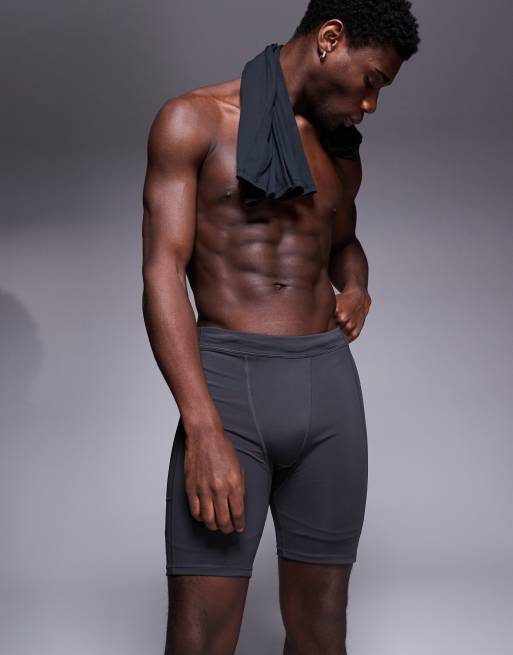 4505 - Short legging à séchage rapide avec logo emblématique et poche pour téléphone - Anthracite