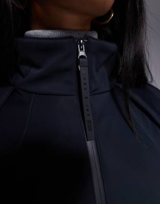 ASOS 4505 Ski belted ski suit with slim kick leg and faux fur hood in black