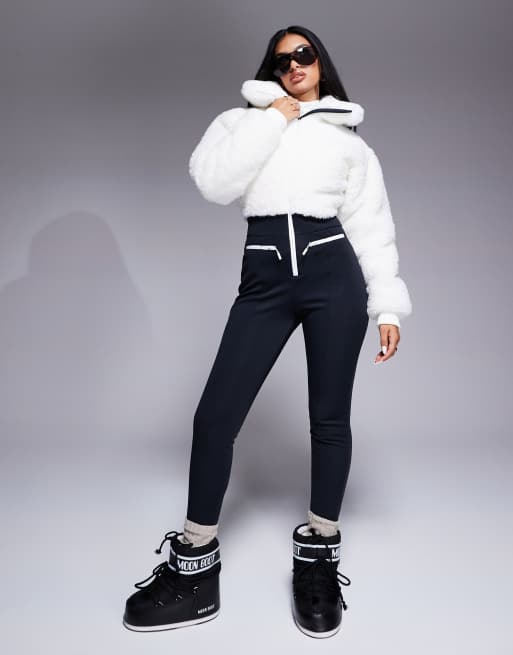 ASOS 4505 Ski suit with faux fur panels and skinny leg in black and white
