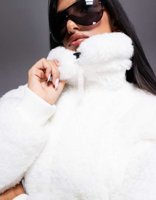 ASOS 4505 Ski suit with faux fur panels and skinny leg in black and white
