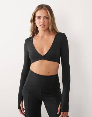 4505 Soft Touch Cross Front Long Sleeve Cropped Top In Black