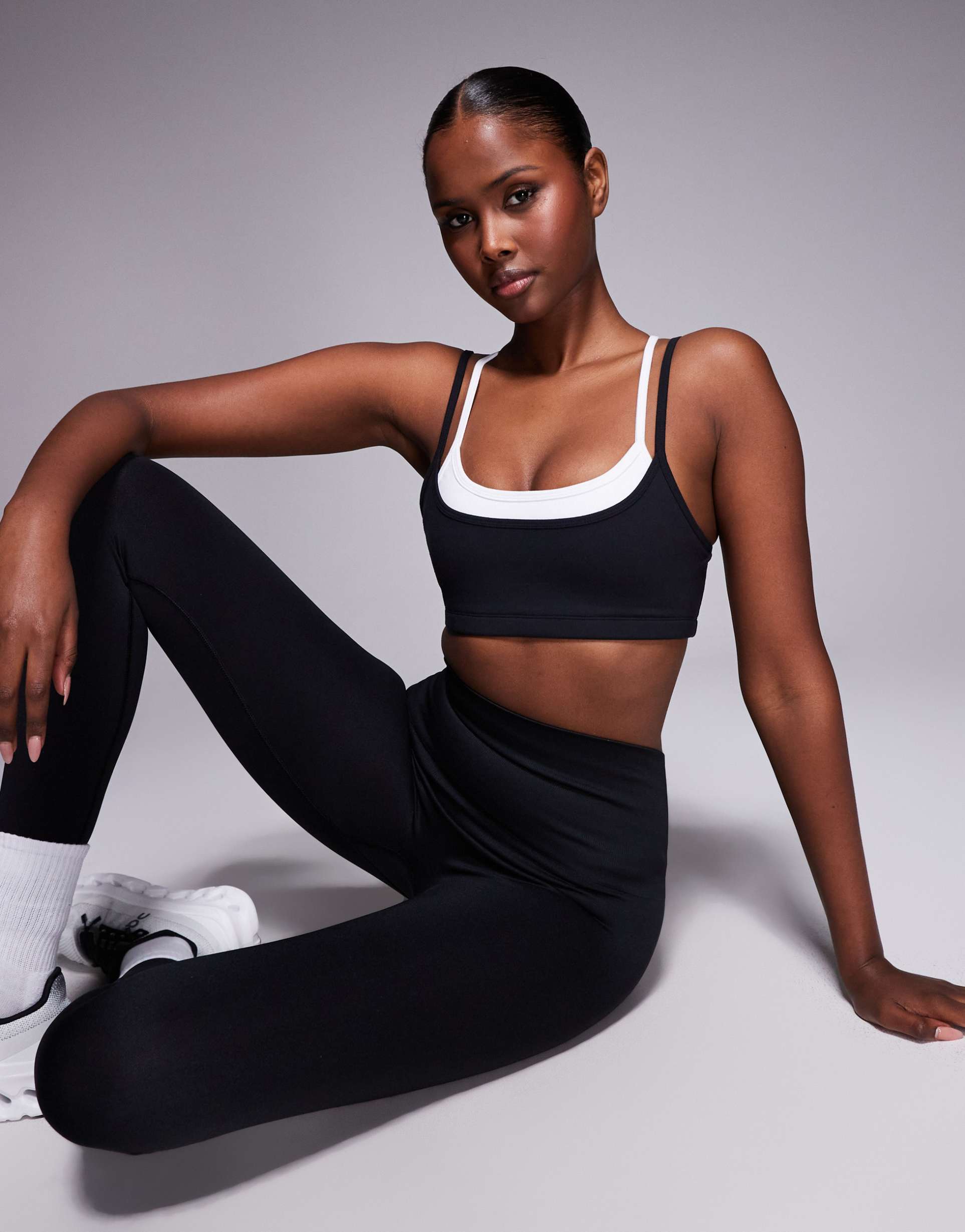 4505 soft touch double layer strappy sports bra with removable padding in black and white