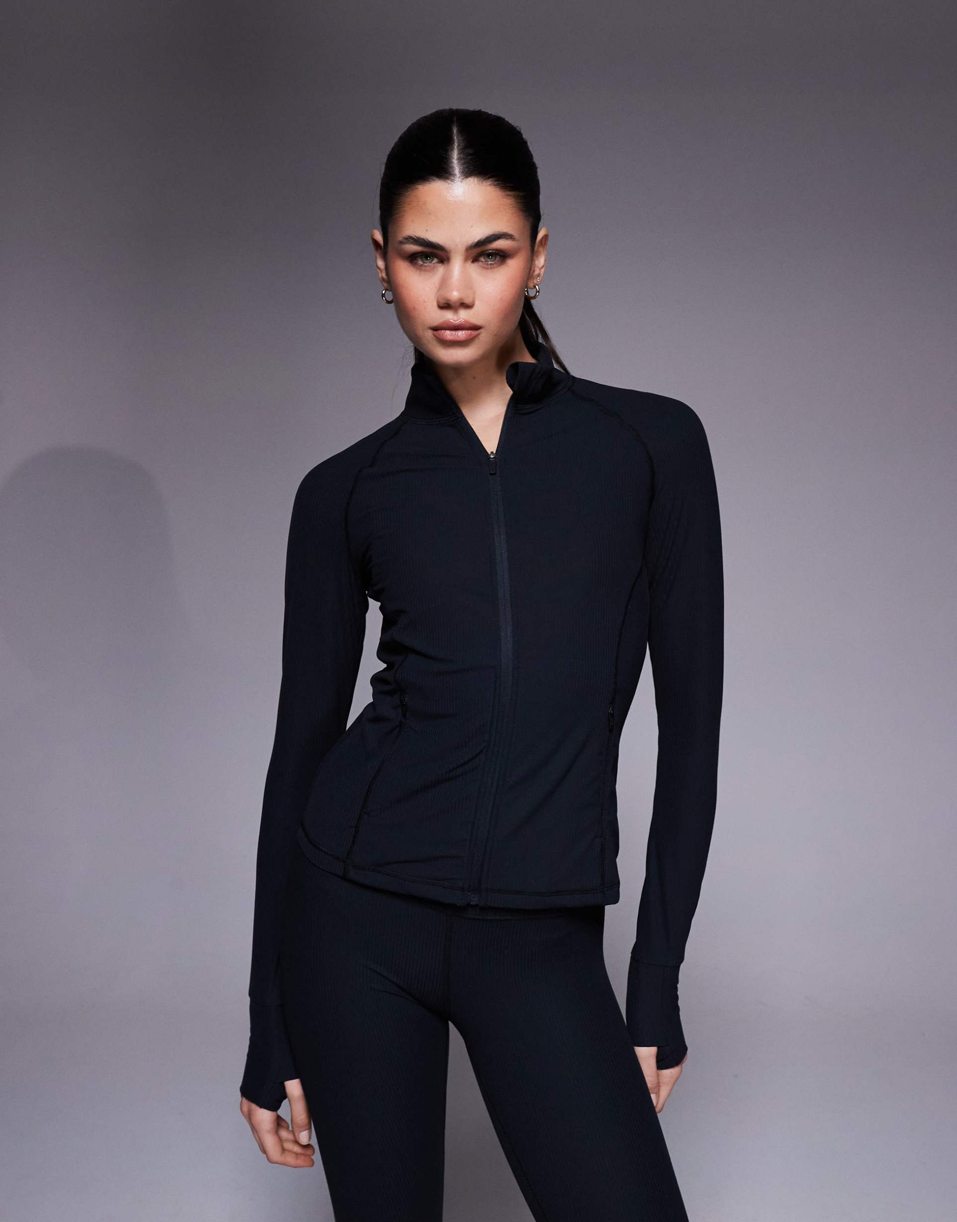 4505 soft touch rib sculpting zip up long sleeve jacket in black