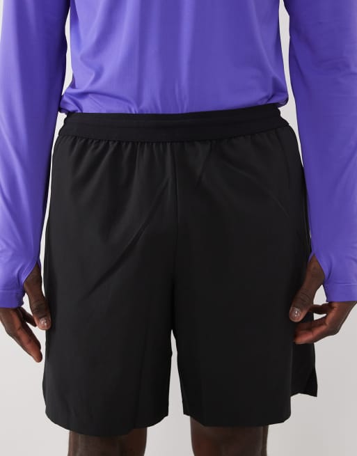 4505 - Sorte 7-tommers træningsshorts i vævet stof med elastisk linning og lynlåslommer, 4 af 5