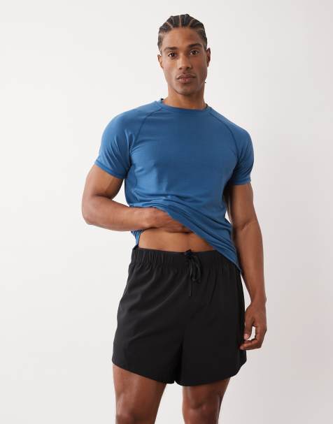 4505 - Sorte vævede 2-i-1-løbeshorts i 13 cm's længde i hurtigttørrende materiale med lynlåslommer - view 1