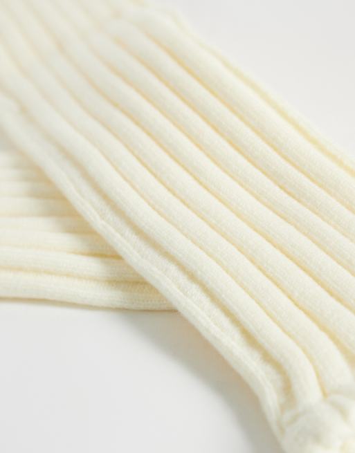 4505 studio knitted leg warmers in buttermilk, 2 of 3